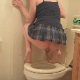 An American, blonde woman with tattoos takes a shit while squatting over a toilet. She finishes up while sitting down on the toilet. Finished product is clearly shown in the toilet bowl. Over 5 minutes.